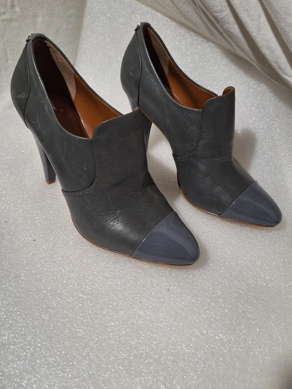Calvin Klein Two-Tone Gray Pointed Toe High Heel Booties
